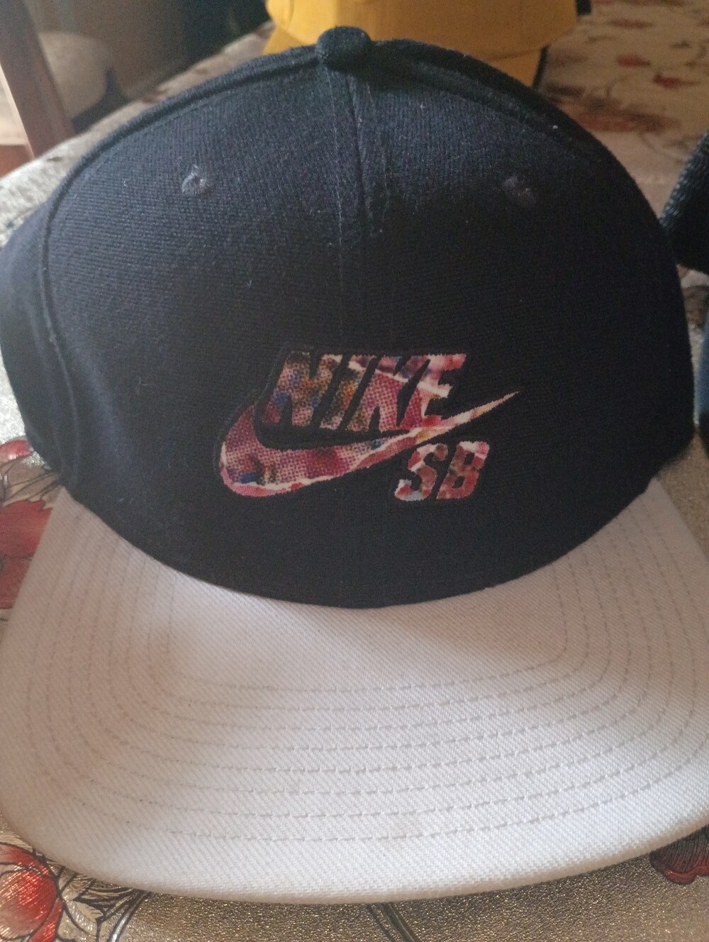 Nike SB Black Hat with White Brim and Multicolor Swoosh